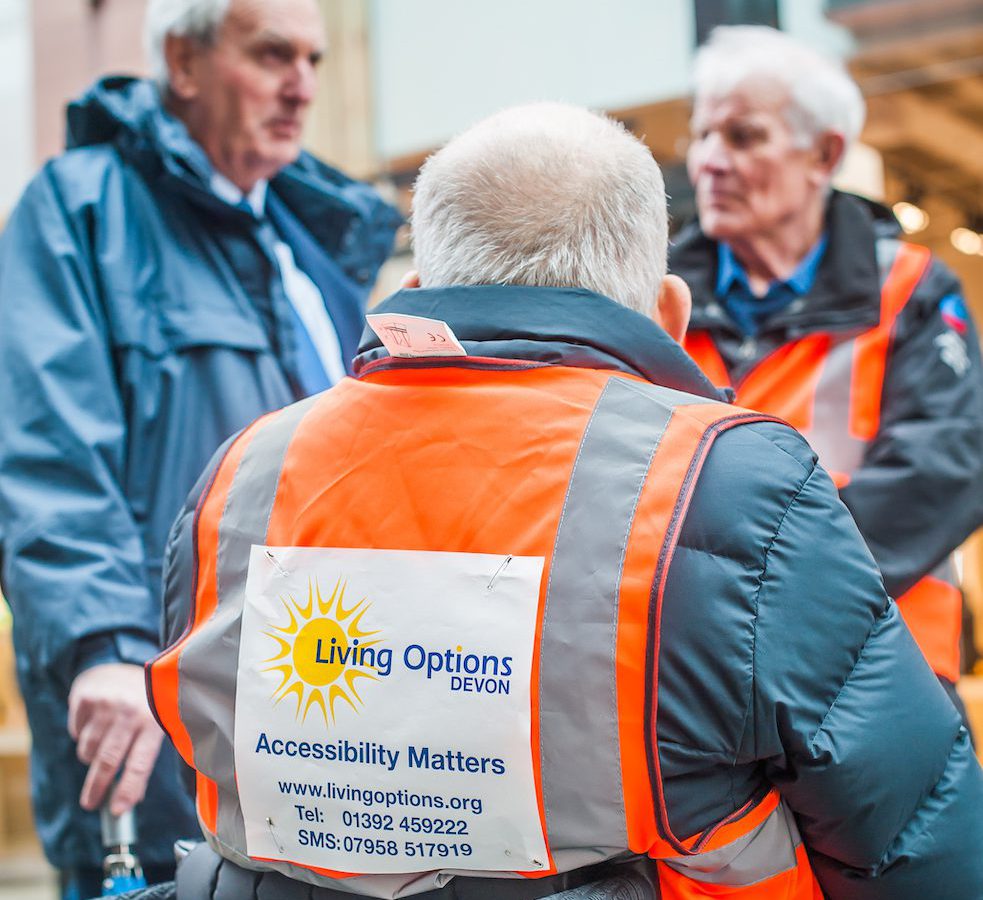 Three Trustees of Living Options Devon at an outdoor event