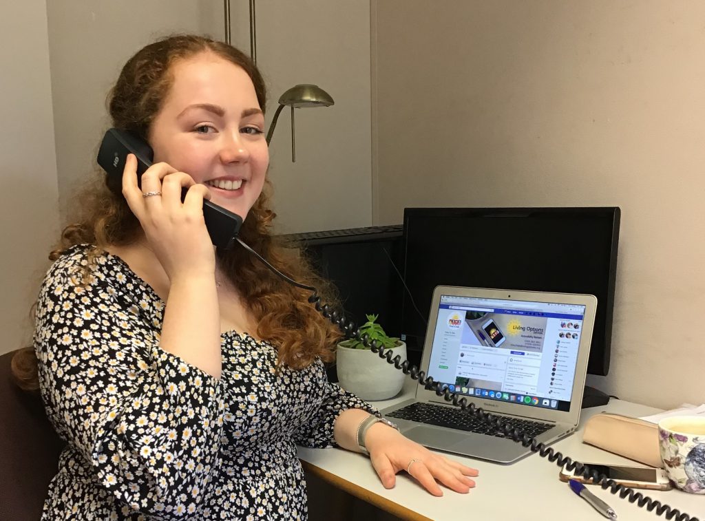 Woman answering telephone