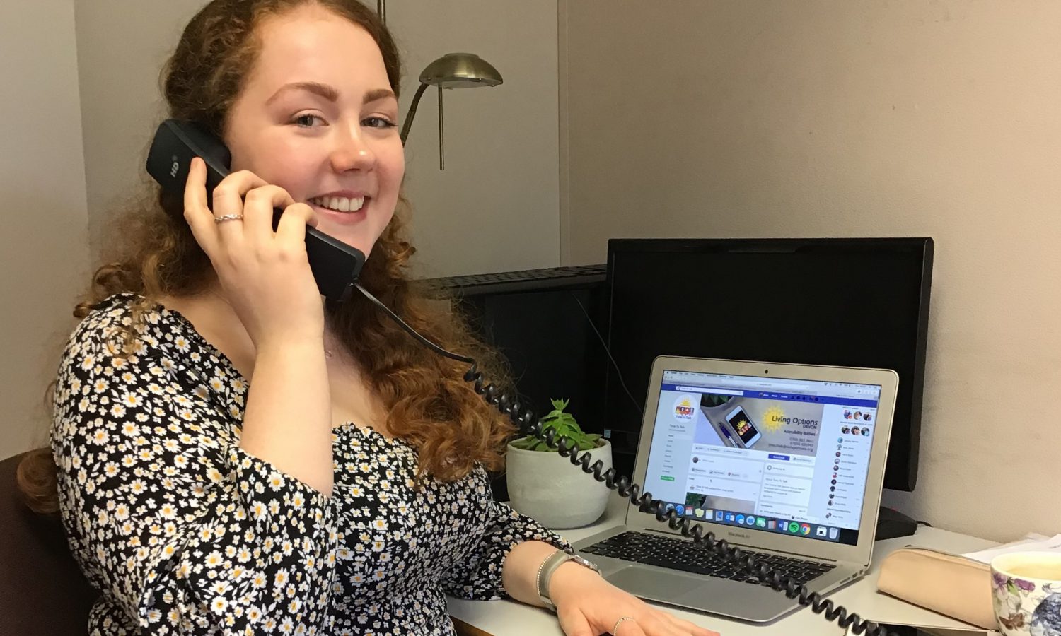 Woman answering telephone
