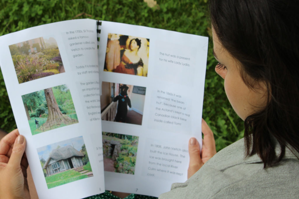 Woman holding open an Easy Read Guide