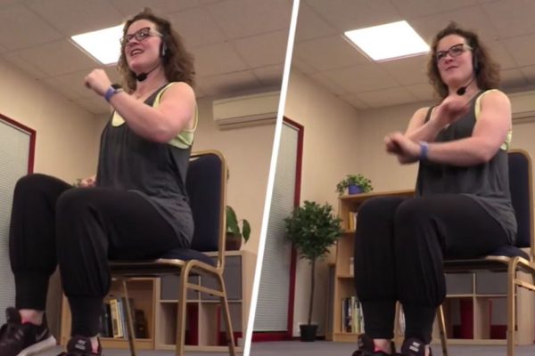 Woman indoors doing seated exercise