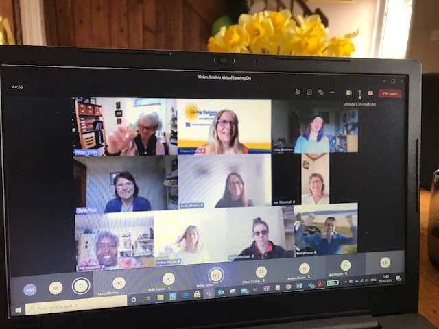 Photo shows a groups of people on a virtual meeting