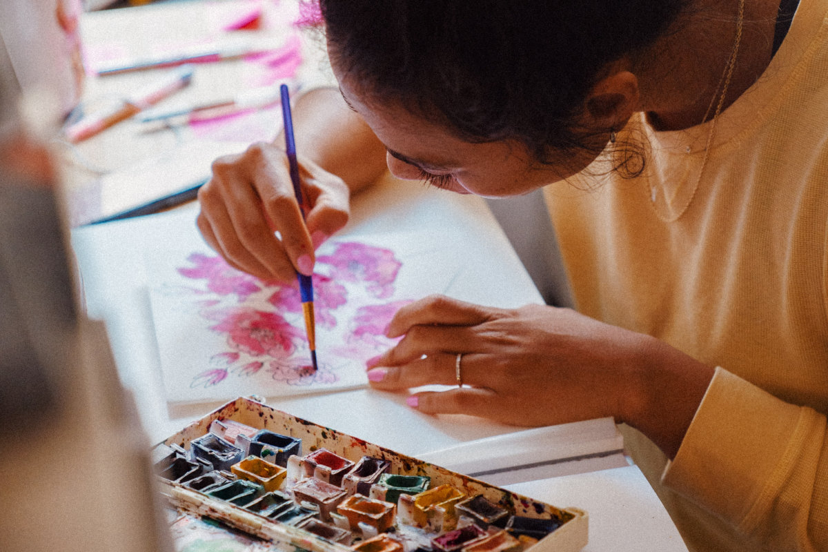 artist painting with water colour paints