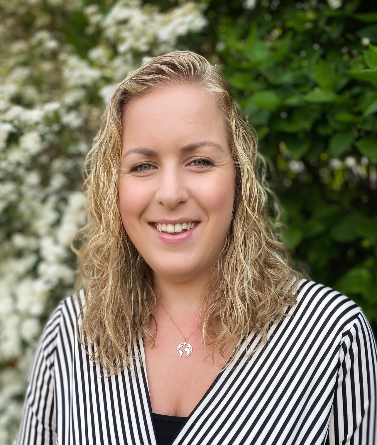 A smiling head and shoulders image of Stephanie Lewis